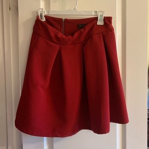 Dark red skirt